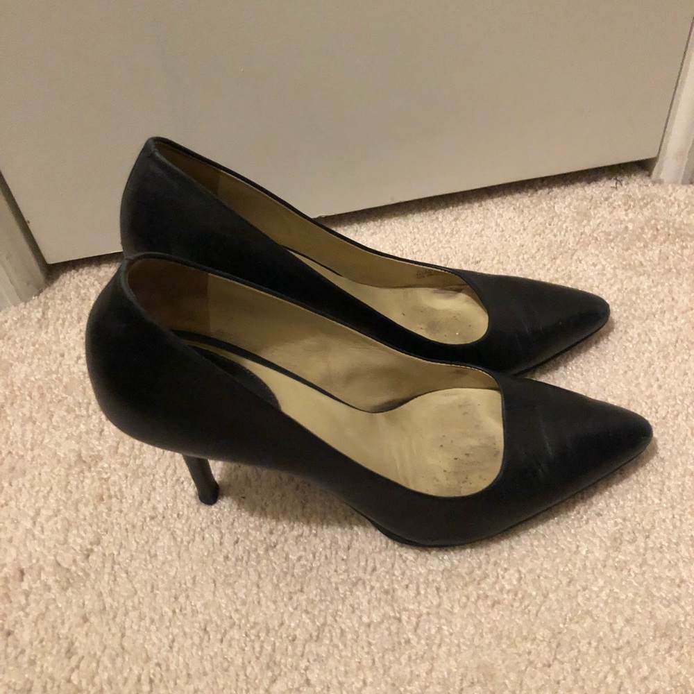 Black leather Cole Haan pumps